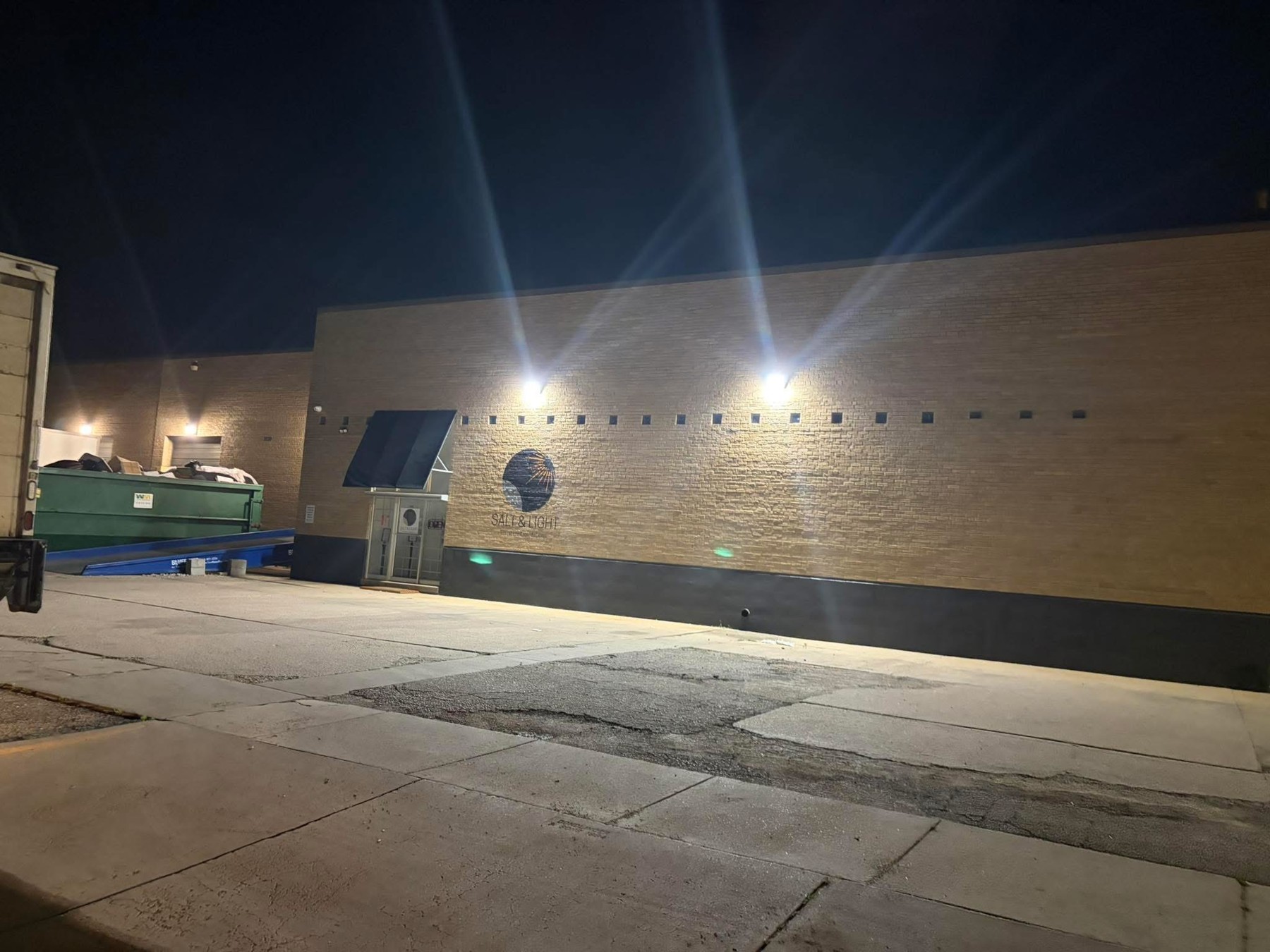 Commercial building exterior illuminated at night