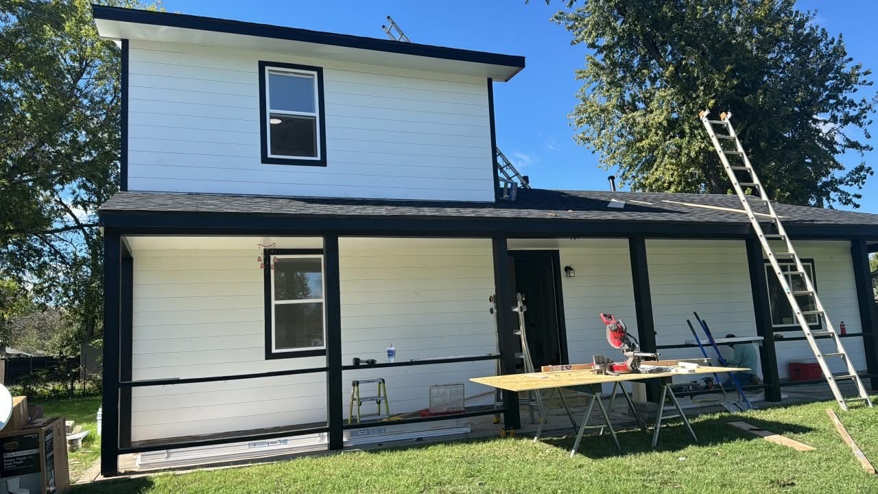 Bandits Construction project: white house with black trim and front porch in Haysville